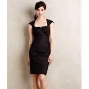 Very professional black dress with button up back!